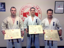 Sensei James Sidwell (4th Dan), Sempai Sammy Vieira (1st Dan) and Sensei Mark Shelmerdine (4th Dan) with their new belts & certificates.