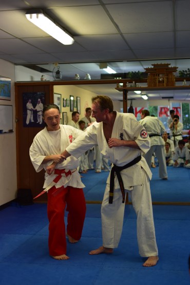 Shihan Ken Ogura demonstrates on Sensei Peter Olive