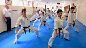 Sempai Jonathan and others performing kata in his Shodan grading.