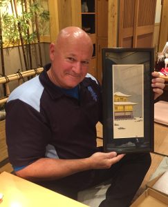 Shihan Rick receives his thank-you gift for leading the sightseeing part of the tour.